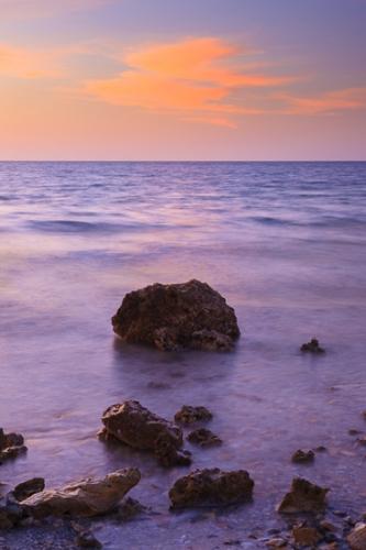 Boulder;Break of Day;Calm;Cloud;Cloud Formation;Clouds;First Light;Florida;Fort Myers;Geological;Geology;Healing;Health care;Healthcare;Ocean;Rock;Rock formations;Rocks;Sand;Sanibel Captiva Island;Sea;Stone;Stones;Sun-up;Water;Waves;Weather;beach;beaches;coast;coastline;dawn;daybreak;morn;morning;peaceful;restful;sea;serene;shore;shoreline;sky;soothing;striation;tranquil